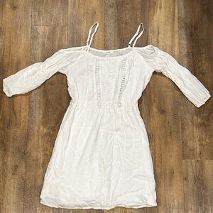 Off the shoulder white dress that goes the mid thigh
